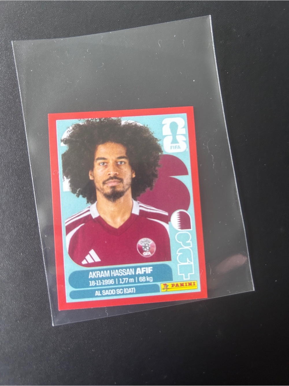Panini FIFA 2026 Sticker - Red Parallel QAT 18 Akram Hassan Afif